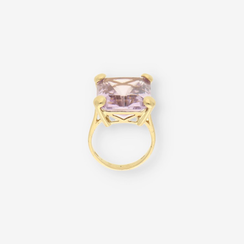Anillo oro piedra lila