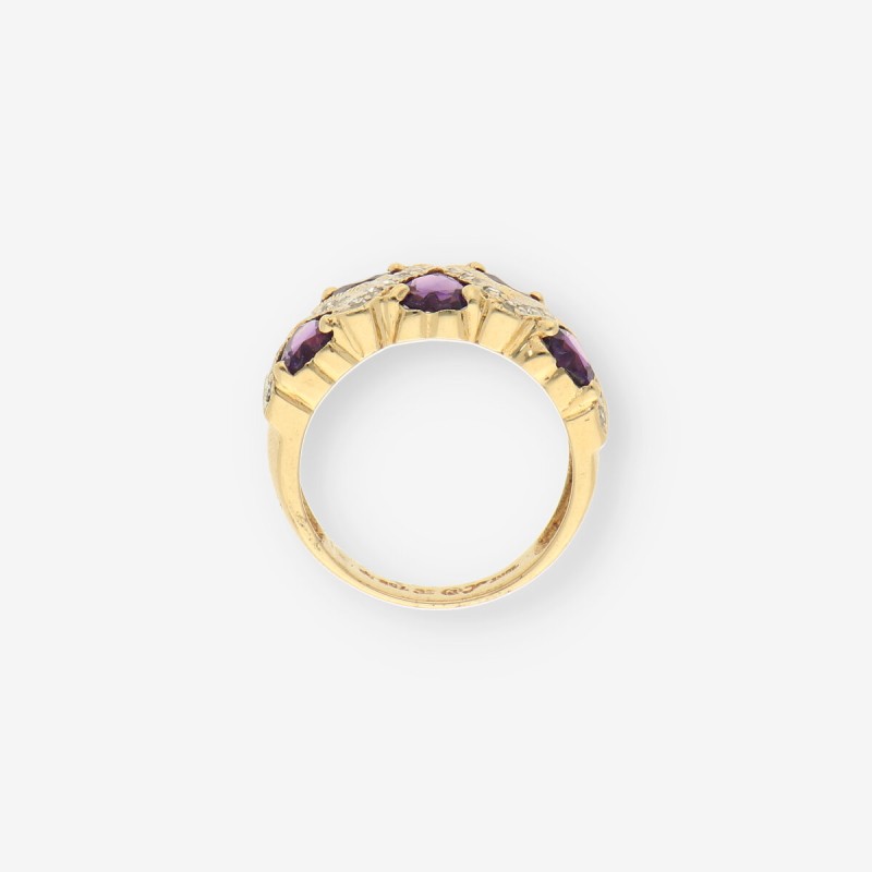 Anillo oro piedra lila y bri