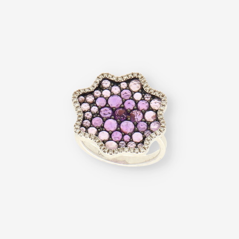 Anillo oro blanco, brillantes y p. lila