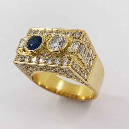 Anillo en oro 18kt con brillantes y zafiro.