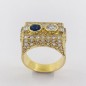 Anillo en oro 18kt con brillantes y zafiro.