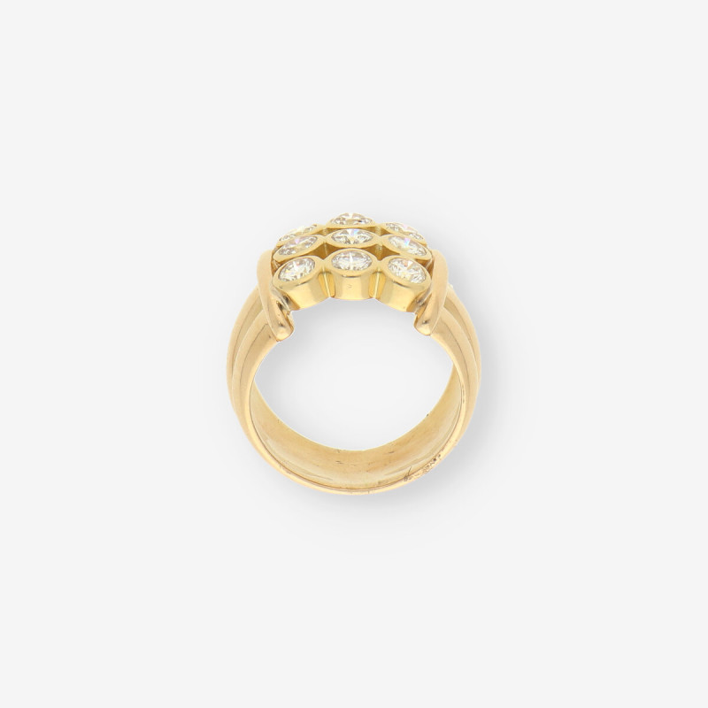 Anillo oro 9 brillantes