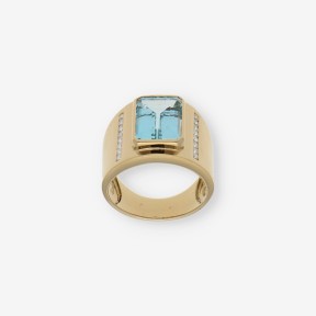 Anillo en oro 18kt con piedra azul y Brillantes