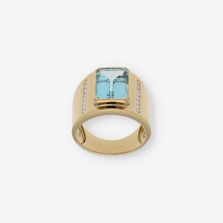 Anillo en oro 18kt con piedra azul y Brillantes