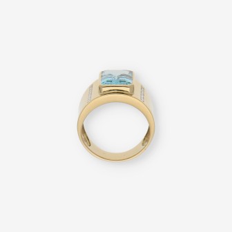 Anillo en oro 18kt con piedra azul y Brillantes