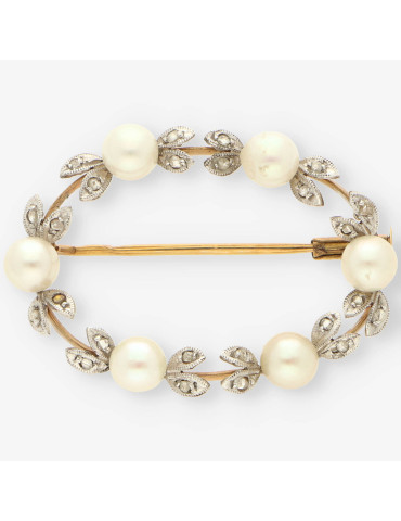 Broche oro blanco perla y diamante