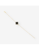 Pulsera oro y colgantes p. negra