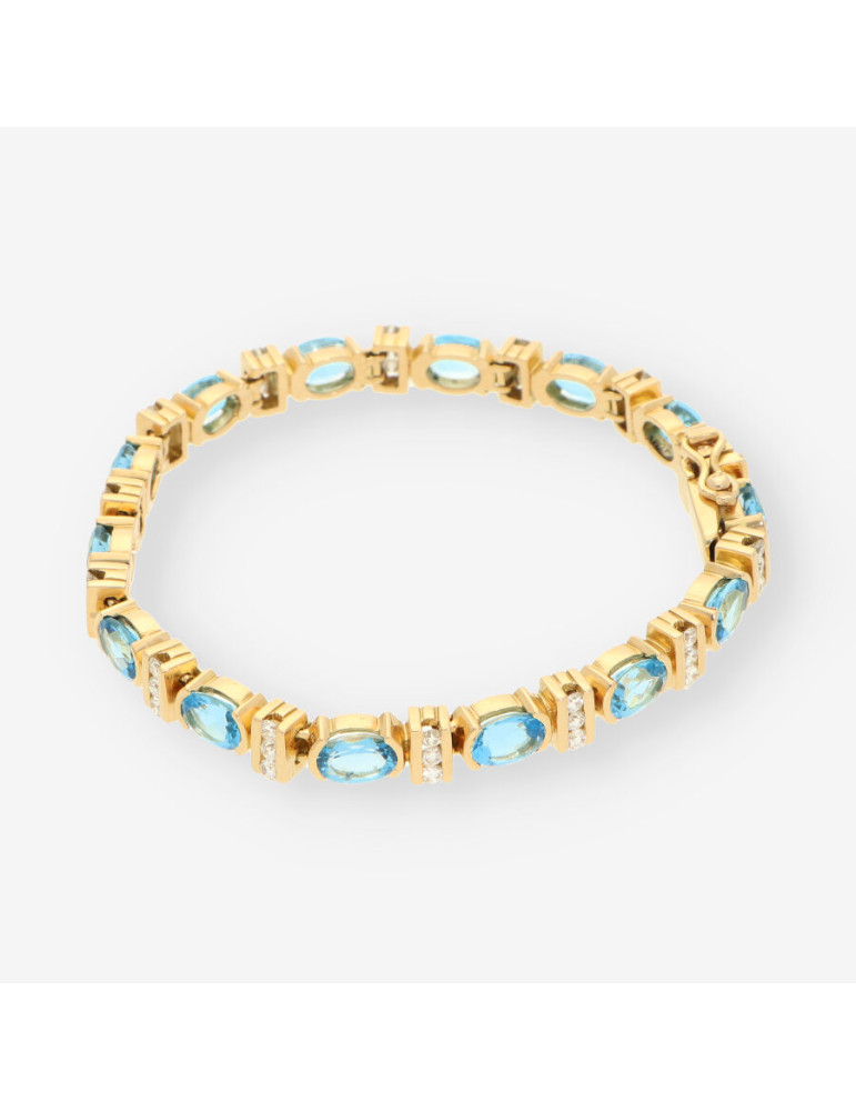 Pulsera p. azul oro y brillantes