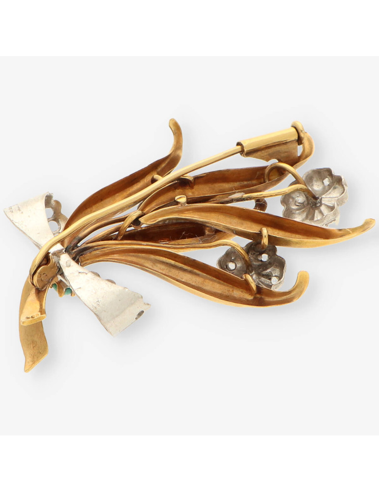 Aguja oro y diamantes
