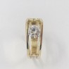 Anillo en oro de 18kt. con doble banda y brillante