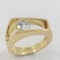 Anillo en oro de 18kt. con doble banda y brillante