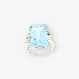 Anillo oro blanco y topacio azul