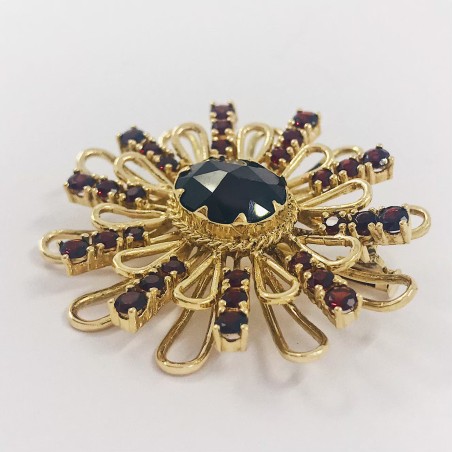 Broche en oro 18kt con granate