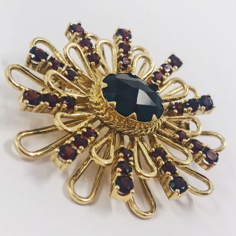 Broche en oro 18kt con granate