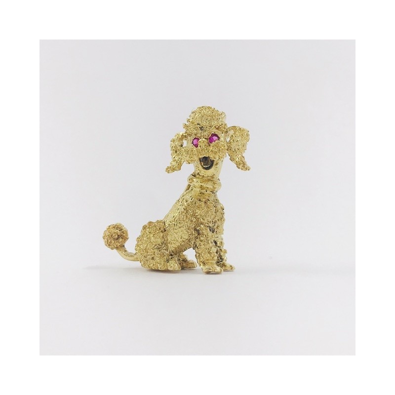 Broche forma de perro en oro 18kt