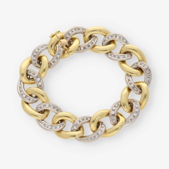 Pulsera barbada en oro bicolor 18kt con brillantes