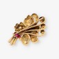 Broche Estilo chevalier oro 18kt y diamantes