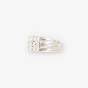 Anillo oro blanco y 9 bri