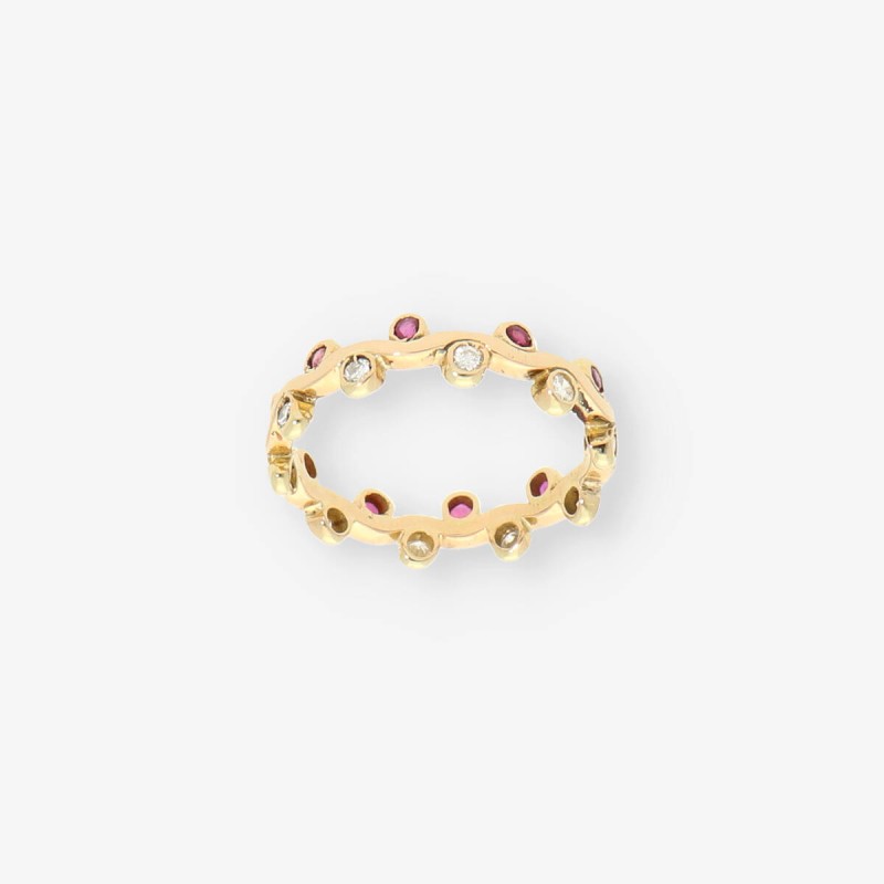 Anillo oro piedra roja y bri