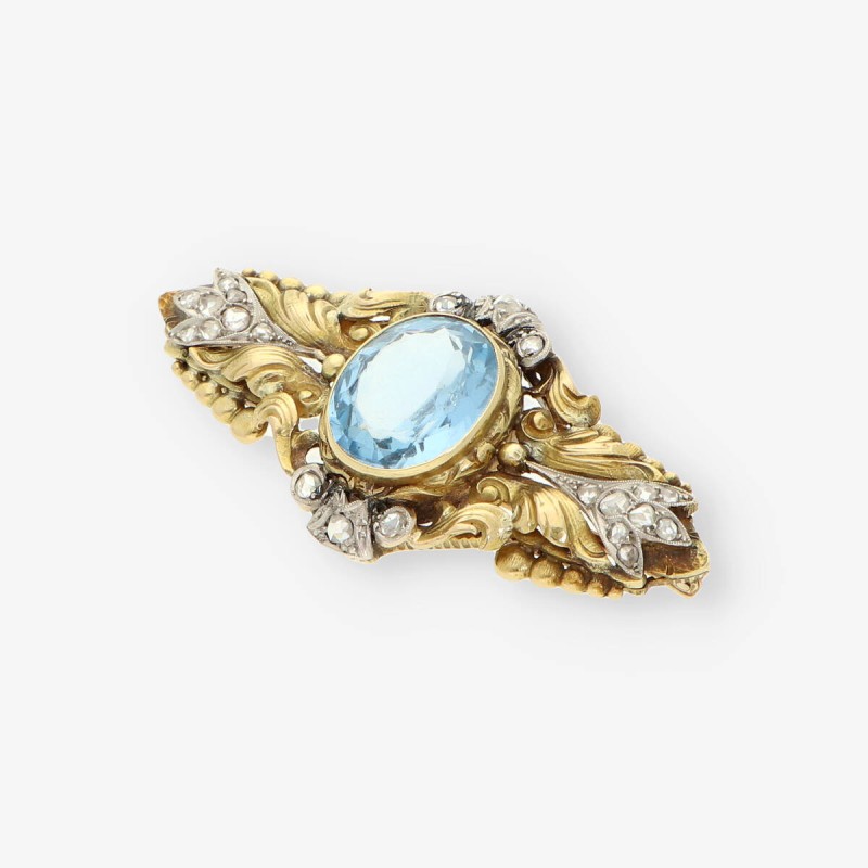 Broche oro topacio azul y diamantes