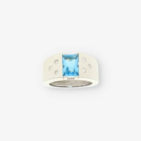 Anillo oro blanco piedra azul y bri