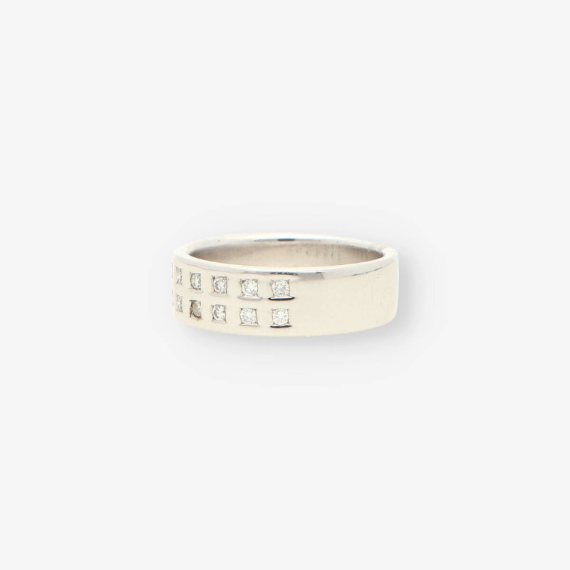 Anillo oro blanco y bri