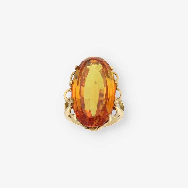 Anillo de oro 18kt con topacio