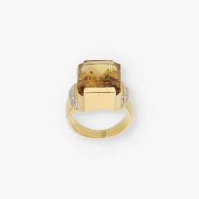 Anillo de oro 18kt con topacio y brillantes