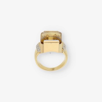 Anillo de oro 18kt con topacio y brillantes