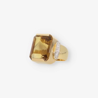 Anillo de oro 18kt con topacio y brillantes