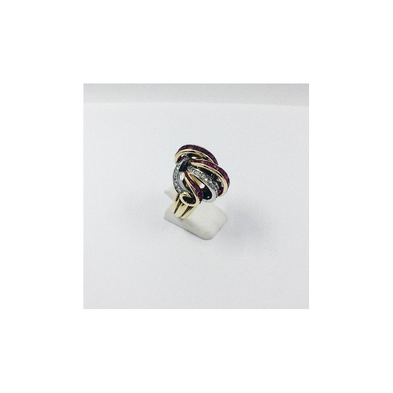 Anillo de oro blanco y amarillo, brillantes y rubÃ­es