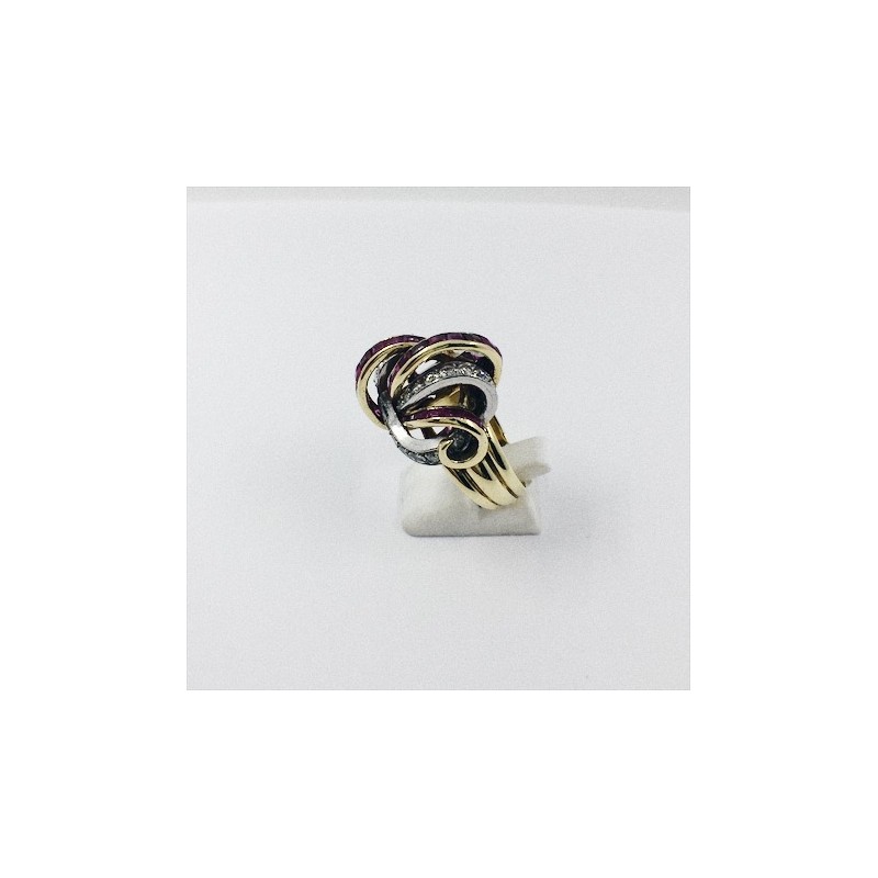 Anillo de oro blanco y amarillo, brillantes y rubÃ­es