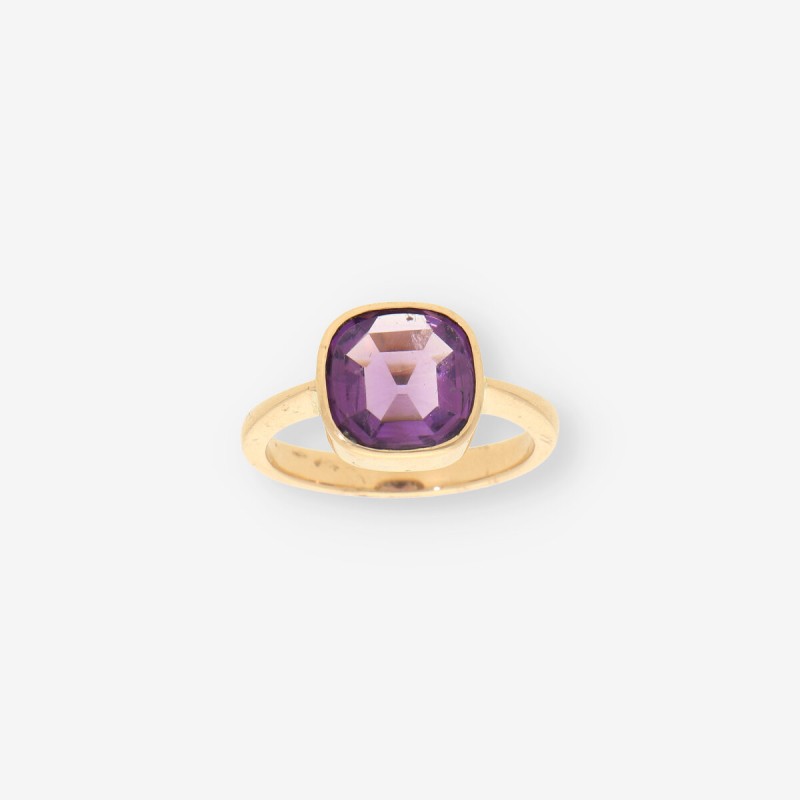 Anillo oro 18kr piedra lila