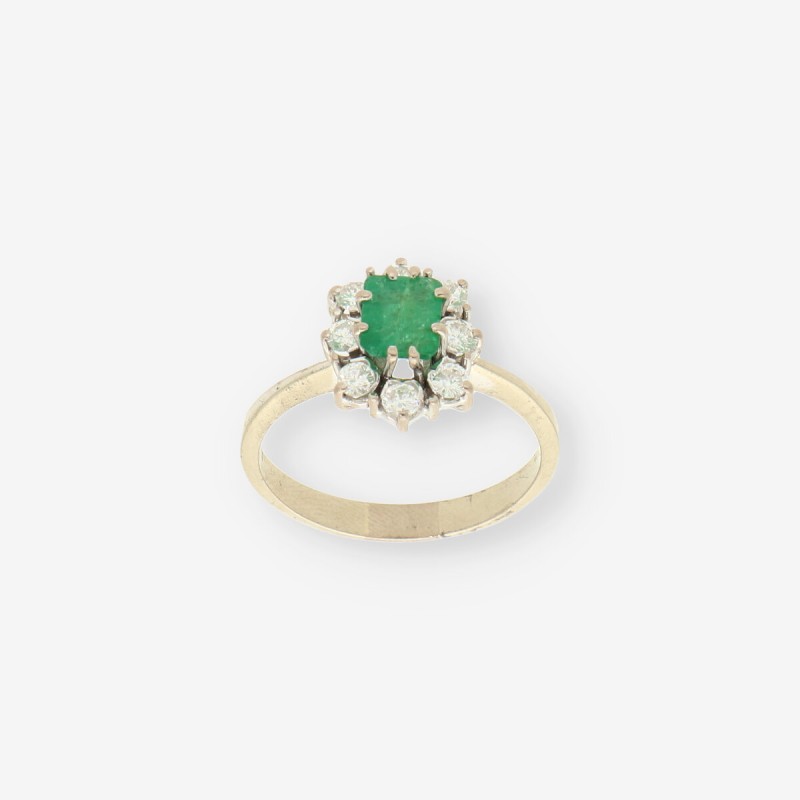 Anillo oro blanco esmeralda y bri