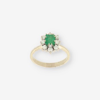 Anillo oro blanco esmeralda y bri