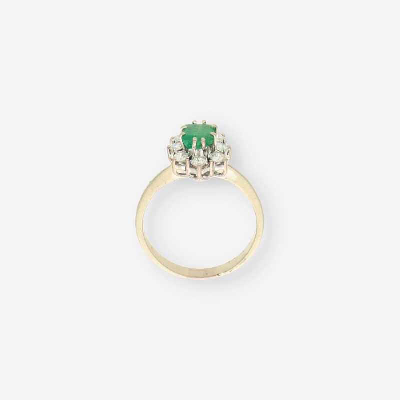 Anillo oro blanco esmeralda y bri