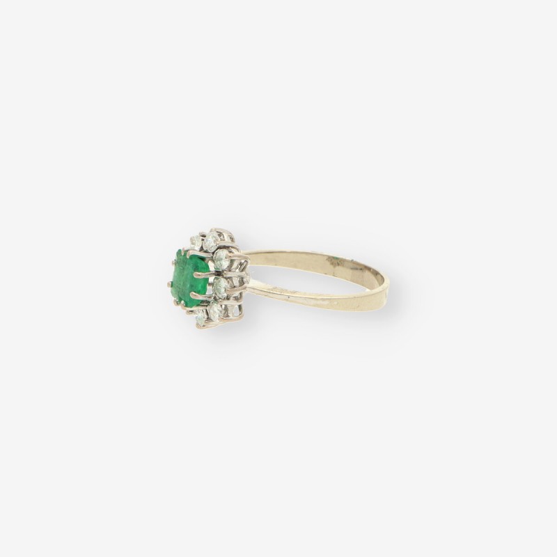 Anillo oro blanco esmeralda y bri