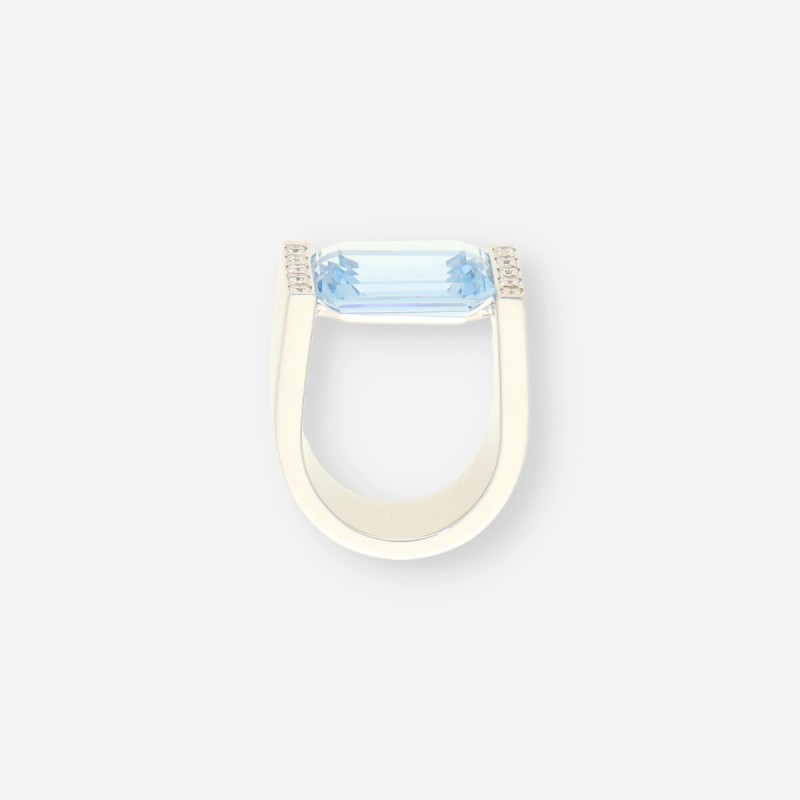 Anillo oro blanco topacio y brillantes