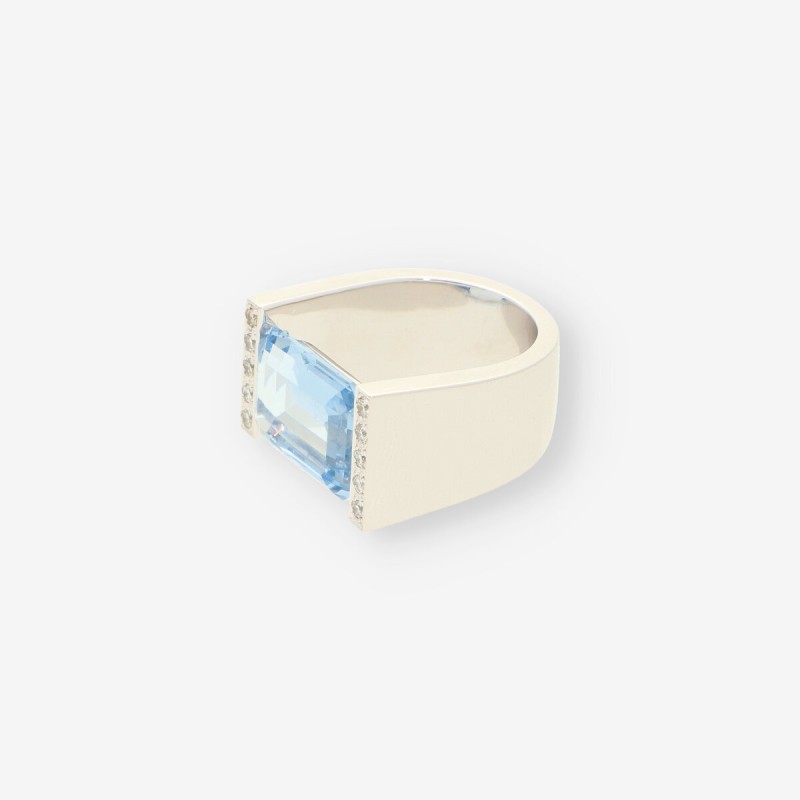 Anillo oro blanco topacio y brillantes